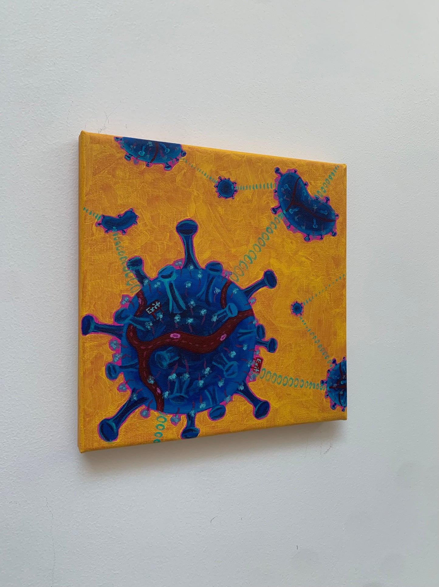 Canvas print of a stylized virus illustration on a yellow background