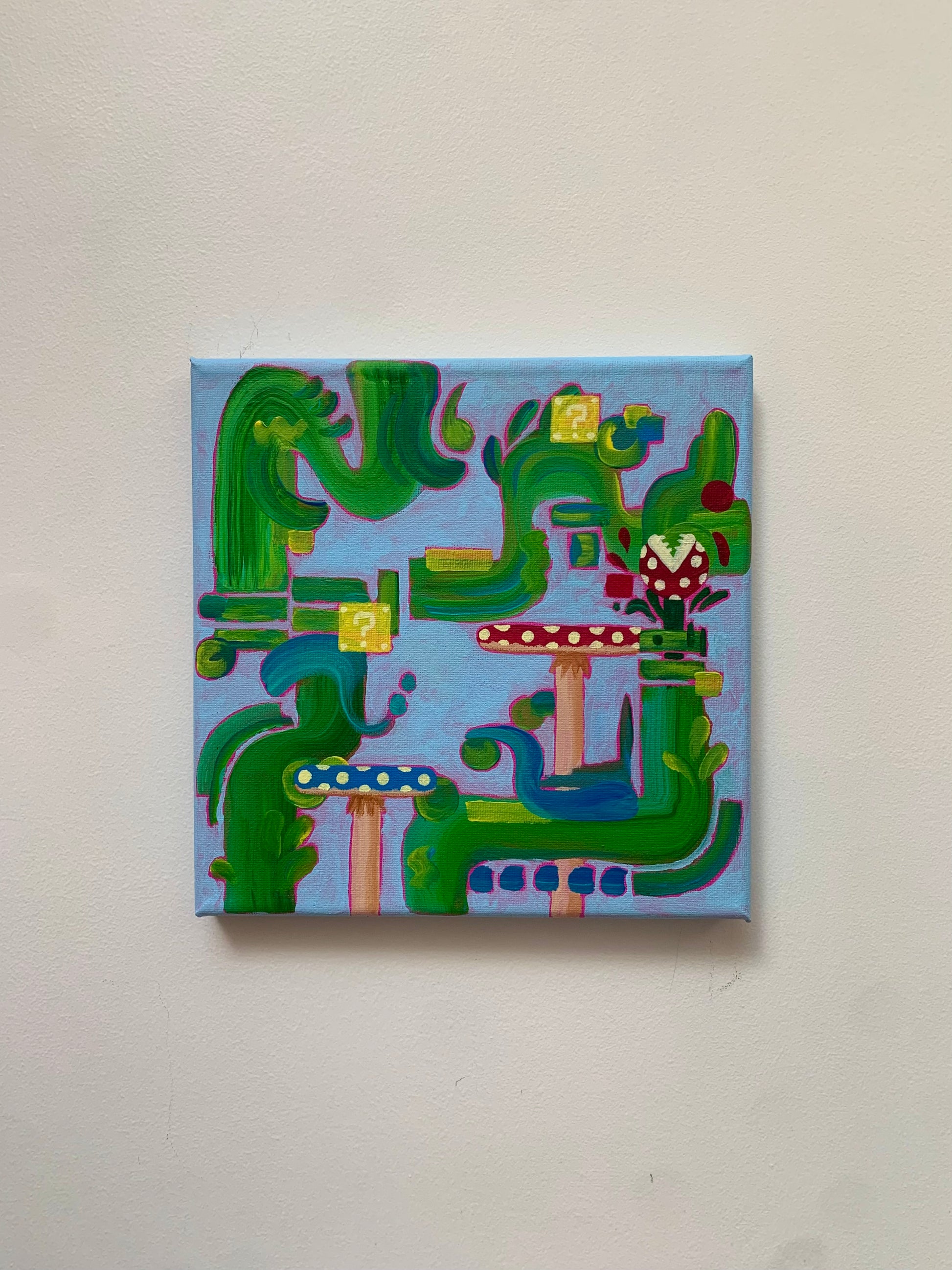 Abstract painting with green and blue shapes on a light gray background