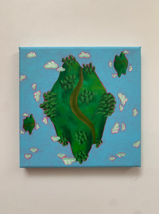 Canvas painting of a green island with a winding path on a blue background