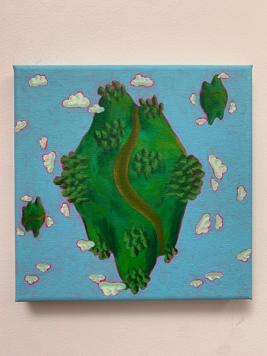 Cartoon-style planet with a road on a blue background with clouds, on a beige surface.